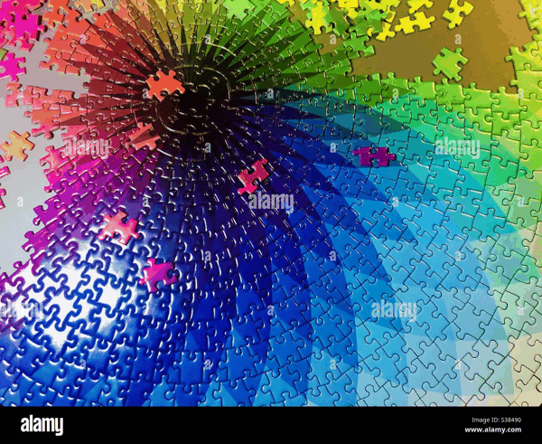 nearly-completed-colorful-jigsaw-puzzle-S38490.jpg